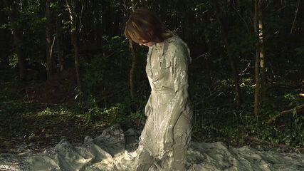 Hot Babe Gets Clay Wet
