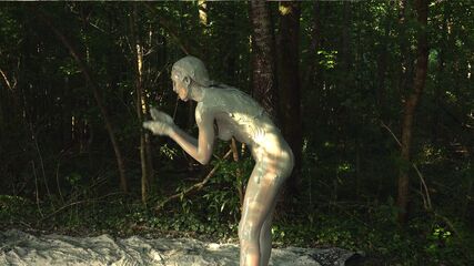 Hot Babe Gets Clay Wet