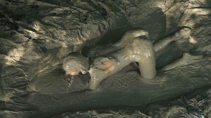 Hot Babe Gets Clay Wet